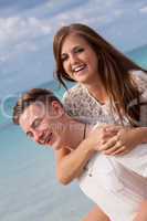 smiling young couple having fun in summer holiday