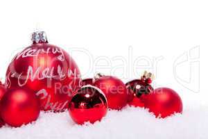 christmas decoration festive red bauble in snow isolated