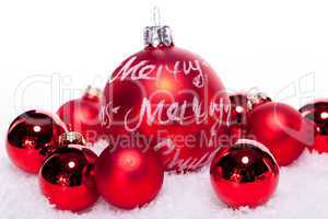 christmas decoration festive red bauble in snow isolated