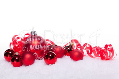 christmas decoration festive red bauble in snow isolated