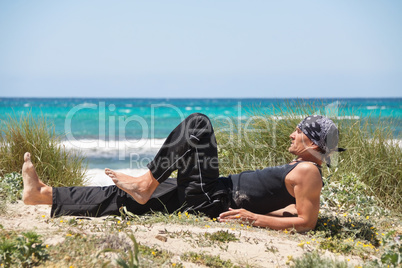 adult healthy man doing pilates yoga exercise