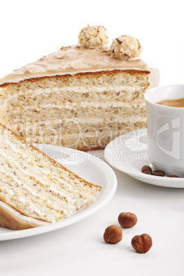 nut cake with coffee isolated on white background