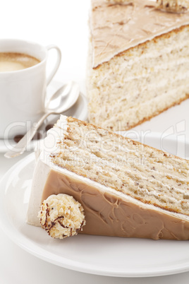 nut cake with coffee isolated on white background