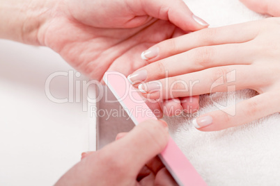 manicure making in beauty spa salon