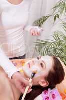 woman face with beauty treatment cosmetic spa