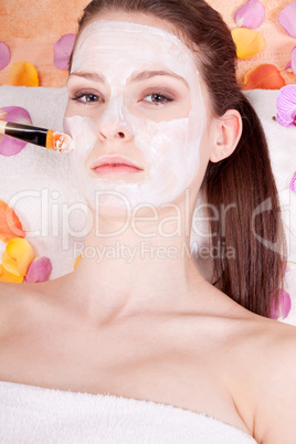 woman face with beauty treatment cosmetic spa