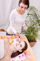 woman face with beauty treatment cosmetic spa