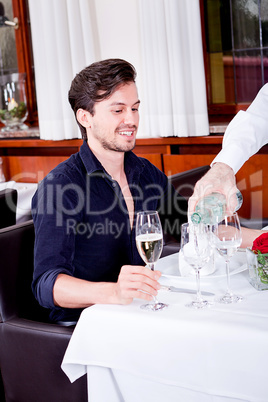 man and woman for dinner in restaurant