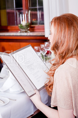 man and woman in restaurant for dinner