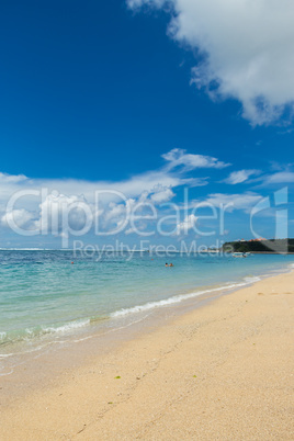 Beautiful tropical beach with lush vegetation