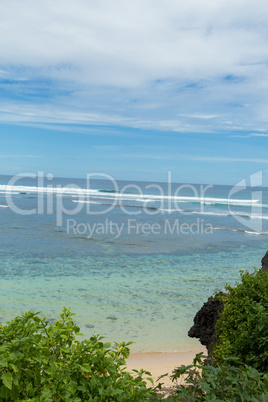 Beautiful tropical beach with lush vegetation