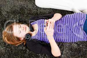 happy teenager girl listening to music