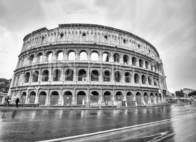 Rome, the Colosseum with wet street