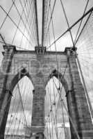 Magnificent structure of Brooklyn Bridge with sunset sky - NYC