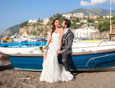 Married couple at the beach in Sorrento coast.