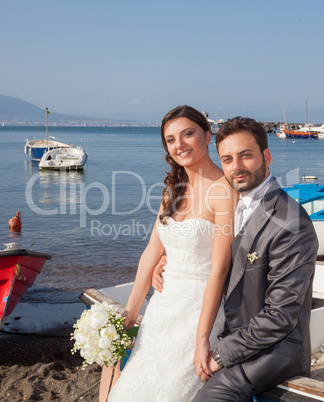 Married couple at the beach in Sorrento coast.