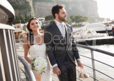 Married couple while strolling near the sea