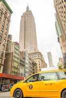 NEW YORK CITY - JUNE 12, 2013: Taxi cab in city street. The are