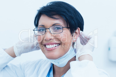 Portrait of smiling female dentist