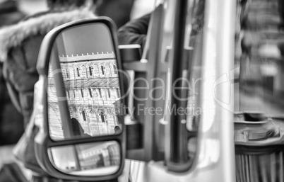 Pisa. Square of Miracles reflected in Car Rear Mirror