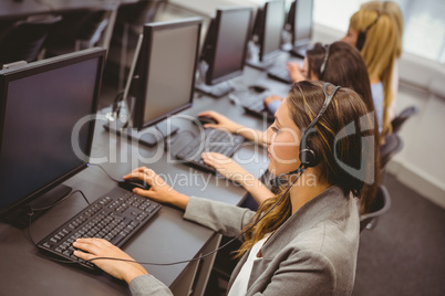 Call centre agents talking on the headset