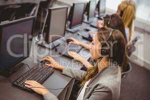 Call centre agents talking on the headset