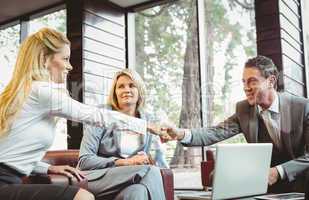 Business people making a deal at a meeting