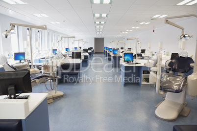 Empty dental clinic with many stations