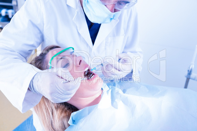 Dentist about to give injection to patient