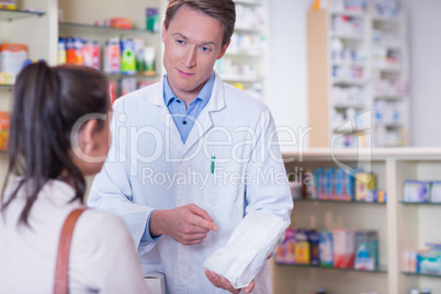 Pharmacist and sick customer speaking