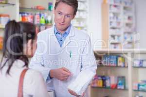 Pharmacist and sick customer speaking