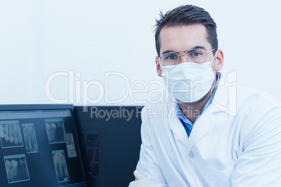 Dentist wearing surgical mask