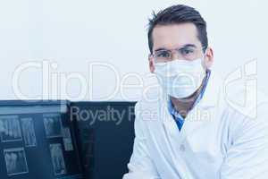Dentist wearing surgical mask