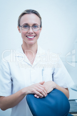 Smiling young female dentist