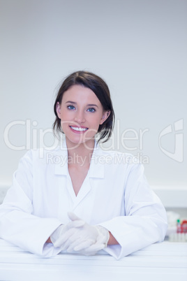 Happy biologist smiling at camera