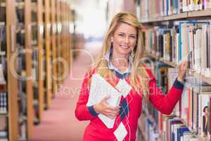 Mature student studying in the library