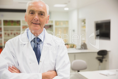 Science professor smiling at camera