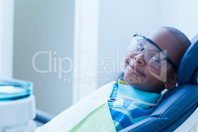 Smiling boy waiting for dental exam