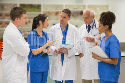 Medical professor talking with students