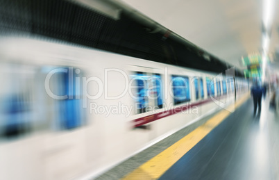 Blurried fast moving train in Rome subway