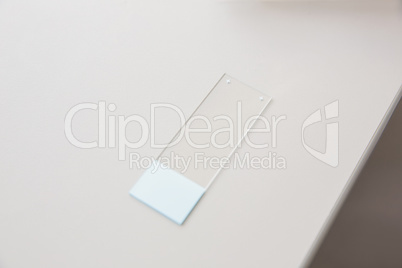Tester slide on a desk