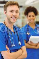 Young medical students smiling at the camera