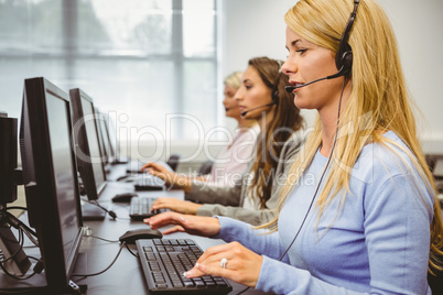 Call centre agents talking on the headset