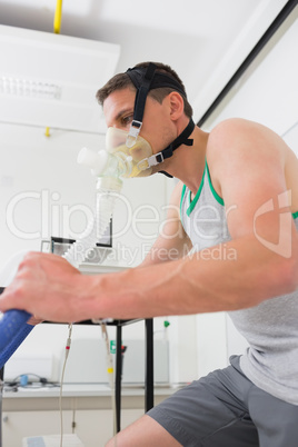 Man doing fitness test on exercise bike