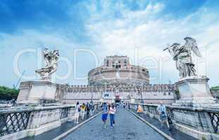 ROME - MAY 15, 2014: Tourists walk near Saint Angel Castle. More