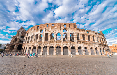 Stunning view of Colosseum in Rome against blue sky