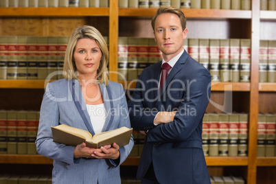 Team of lawyers in the law library
