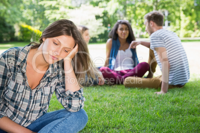 Lonely student feeling excluded on campus