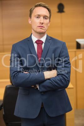 Serious lawyer looking at camera