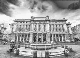 ROME - JUNE 14, 2014: Tourists walk in Piazza Colonna. More than